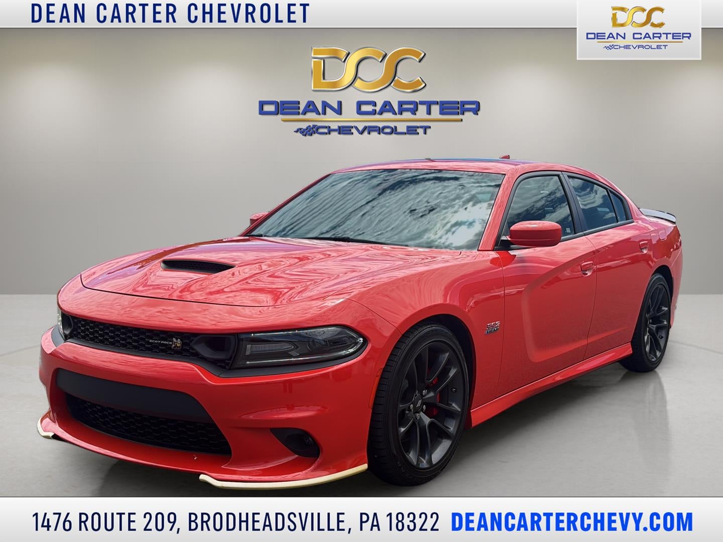 2021 Dodge Charger Scat Pack in Orange — front three-quarter view