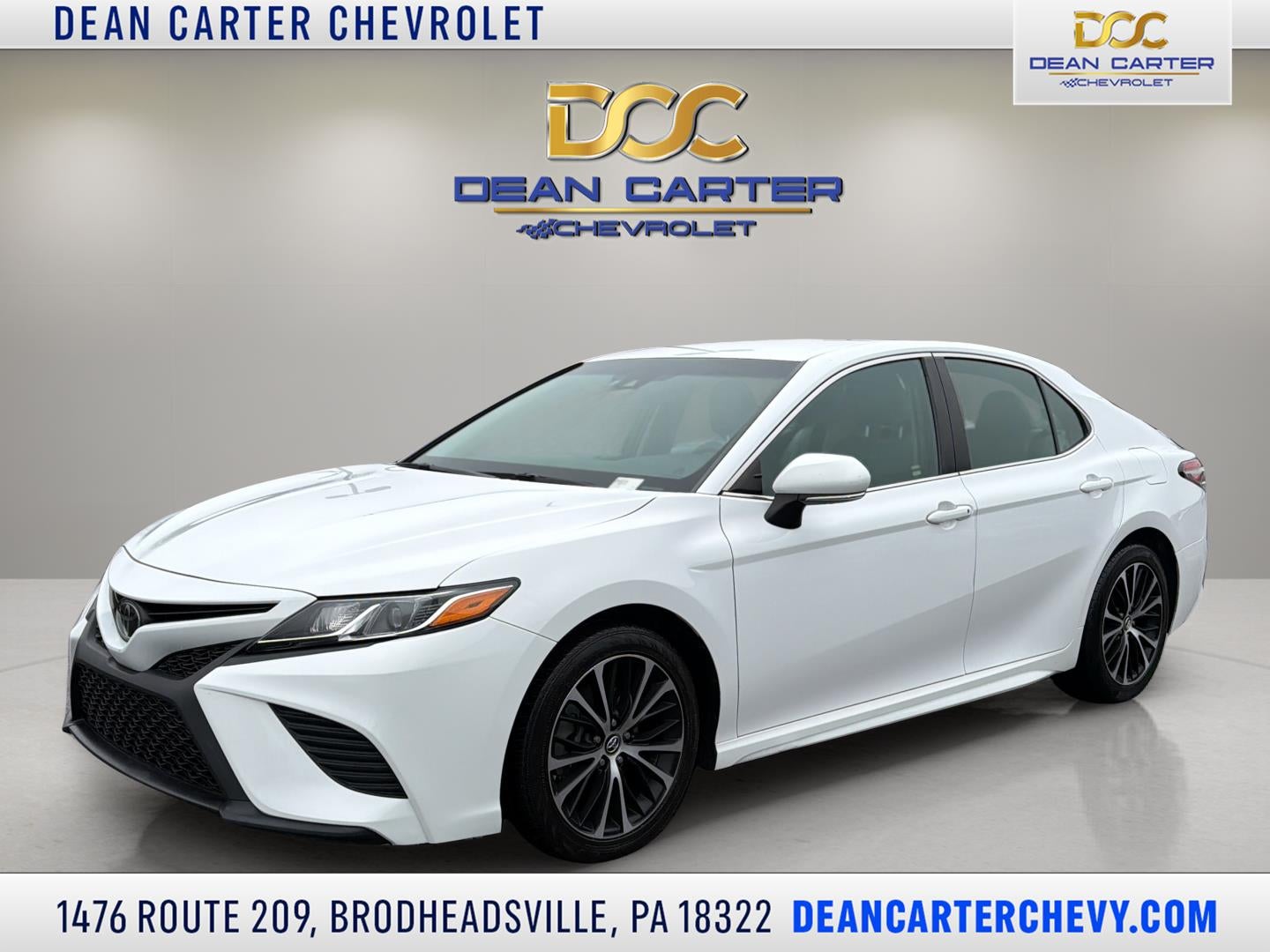 2018 Toyota Camry LE in White — front three-quarter view