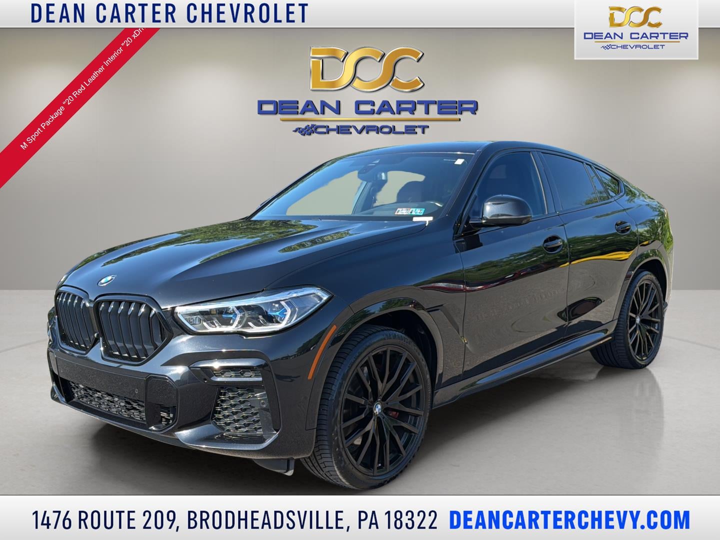2022 BMW X6 xDrive40i in Black — front three-quarter view
